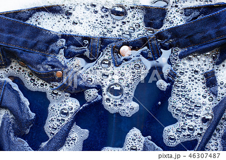 Wet Jeans, Soak and  Washing. 46307487