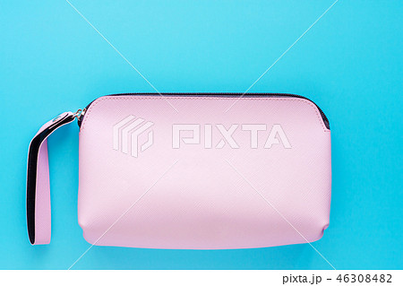 Pink lady leather bag on blue background Pink lady leather bag on blue background 46308482