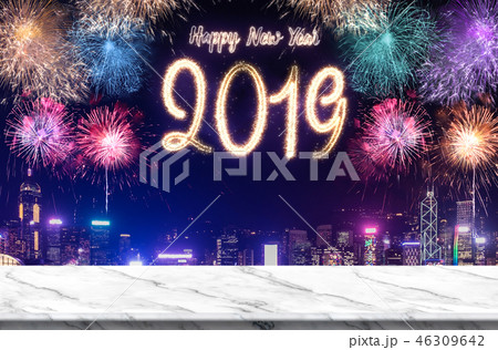 Happy new year 2019 fireworks over cityscape 46309642