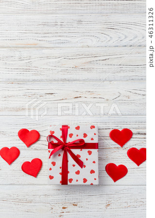 holiday handmade present in paper with red heart holiday handmade present in paper with red heart 46311326