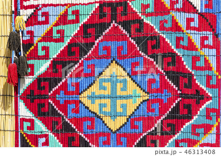 Market stalls with decorative tribal textile 46313408