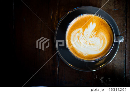 hot latte art coffee on wood table, relax time hot latte art coffee on wood table, relax time 46318293