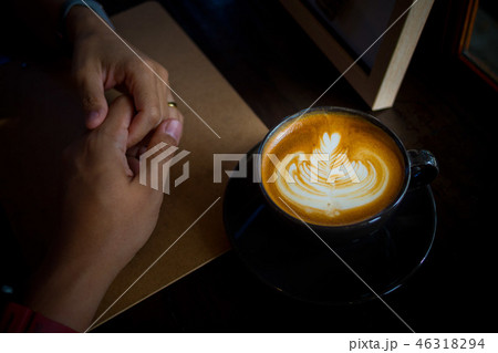 hot latte art coffee on wood table, relax time hot latte art coffee on wood table, relax time 46318294
