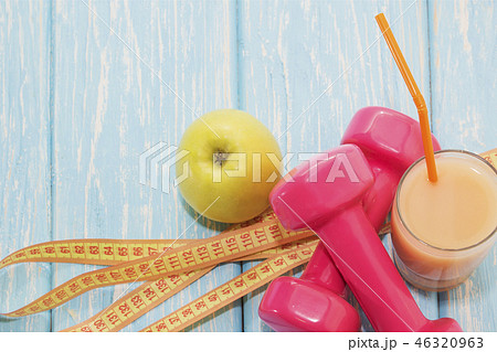 The concept of a healthy diet. Small dumbbells 46320963