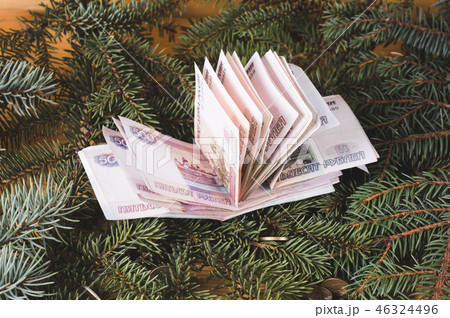 russian ruble banknotes at Christmas or New Year russian ruble banknotes at Christmas or New Year 46324496