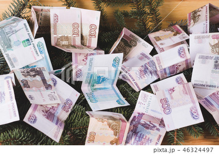 russian ruble banknotes at Christmas or New Year russian ruble banknotes at Christmas or New Year 46324497