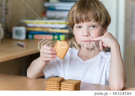 child eating cookies 46328584