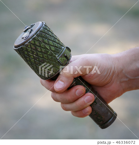 Antitank grenade in the male hand close-up 46336072