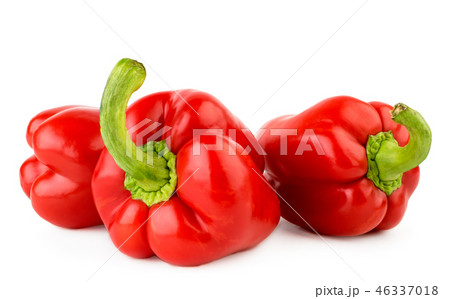 Three red bell peppers close up on a white Three red bell peppers close up on a white 46337018