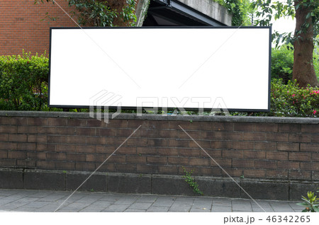 Large blank billboard on a street wall, 46342265