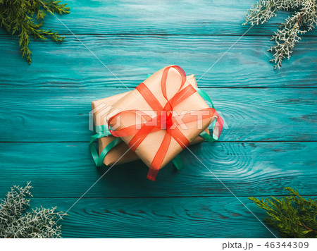 Christmas gift boxes on green background Christmas gift boxes on green background 46344309