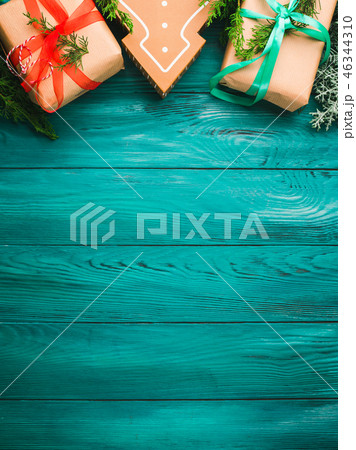 Christmas gift boxes on green background 46344310