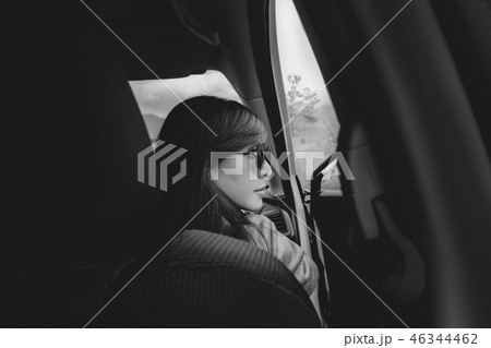 Portrait of Young Adult Woman sitting in Car 46344462