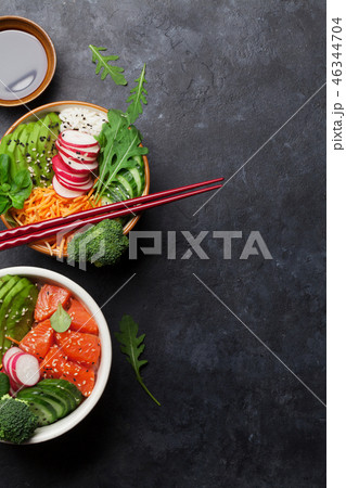 Poke bowl with salmon and vegetables 46344704