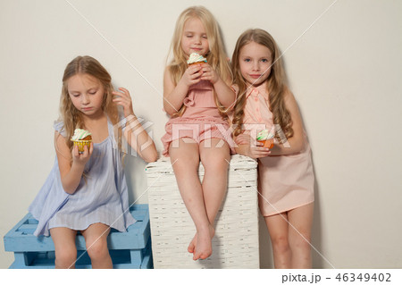 three girls girlfriend eat candy lollipop sister 46349402