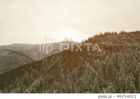 Slopes of the mountains with dense snow-covered 46354021