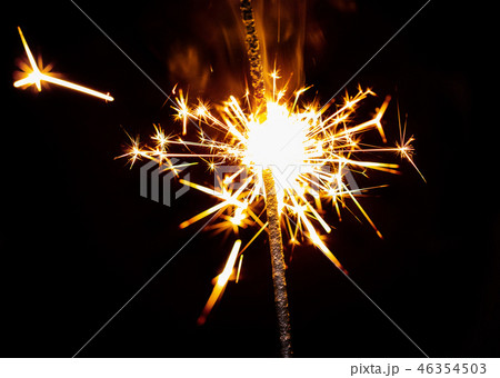 burning sparkler close-up burning sparkler close-up 46354503