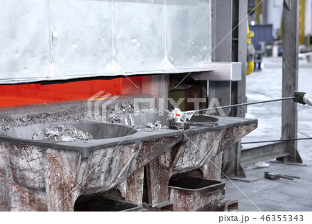 sampling metal liquid in a foundry 46355343
