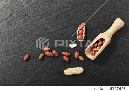 peanuts on black background 46357663