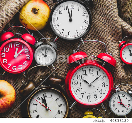 Apples and alarm clocks  46358189