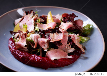 warm salad with goose meat and beetroot mousse warm salad with goose meat and beetroot mousse 46358515