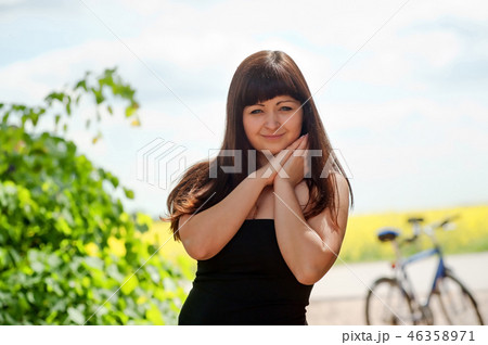 Beauty woman with bicycle 46358971