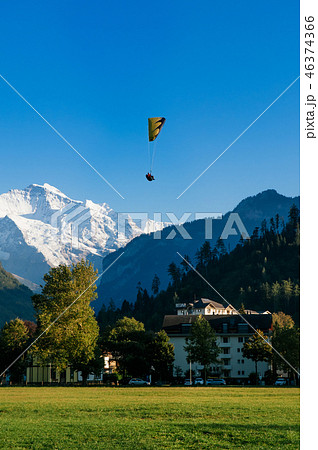 Paragliding over Hohematte park and Swiss alps Paragliding over Hohematte park and Swiss alps 46374366
