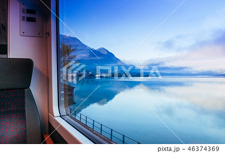 Thunersee lake in Switzerland through train window 46374369