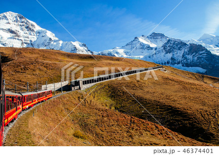 Jungfrau railway train climbing to Jungfraujoch 46374401