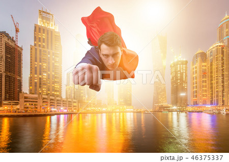 Superhero businessman flying over the city Superhero businessman flying over the city 46375337
