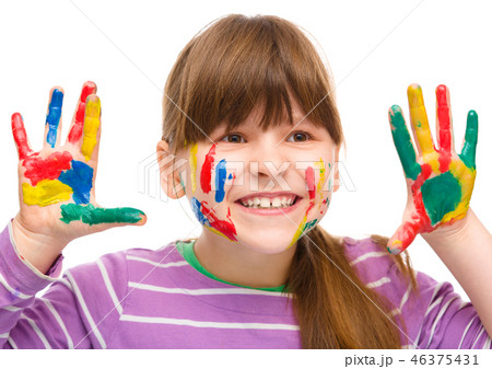 Portrait of a cute girl playing with paints Portrait of a cute girl playing with paints 46375431