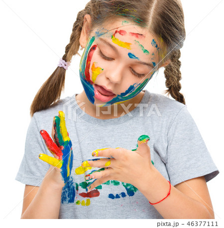 Portrait of a cute girl playing with paints 46377111