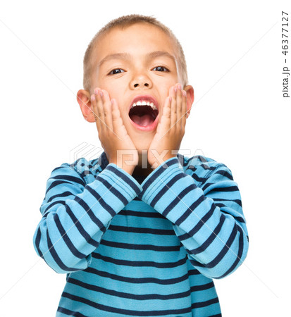 Portrait of an astonished little boy Portrait of an astonished little boy 46377127