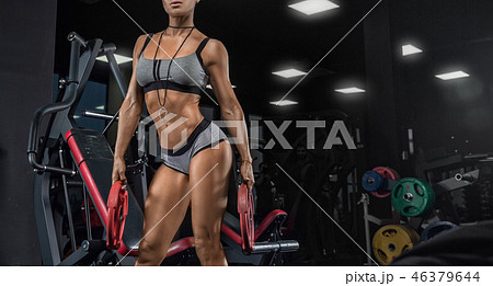 Sexy athletic girl workout in gym. Sexy athletic girl workout in gym. 46379644