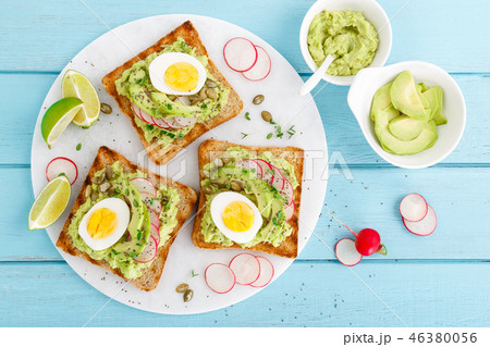 Toasts with avocado guacamole, fresh radish Toasts with avocado guacamole, fresh radish 46380056