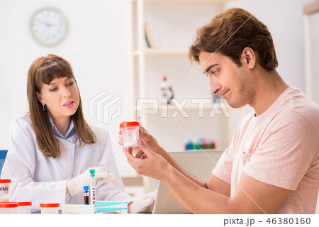 Male sperm donor visiting clinic 46380160