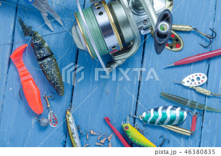Fishing lures and fishing reel with tools. Fishing lures and fishing reel with tools. 46380835