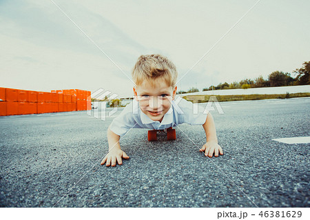 Boy on penny board close-up in the parking 46381629