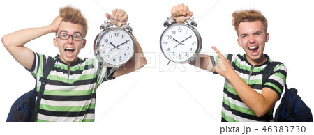 Young student with alarm-clock in time management concept Young student with alarm-clock in time management concept 46383730