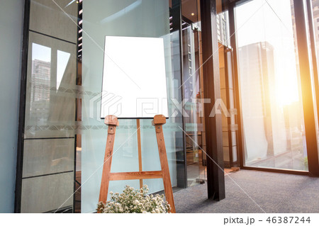 Wooden board with blank poster, display floor stand in banner ad Wooden board with blank poster, display floor stand in banner ad 46387244