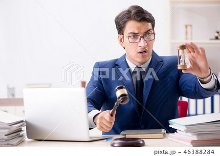 Young handsome judge working in court Young handsome judge working in court 46388284