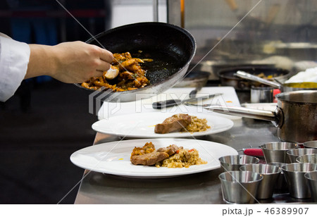 Chef preparing food in the kitchen, chef cooking Chef preparing food in the kitchen, chef cooking 46389907