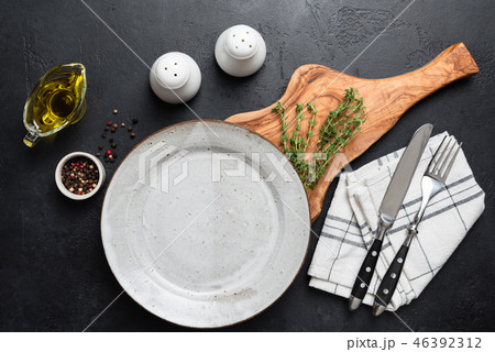 Empty plate, cutlery and spices 46392312