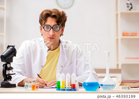 Funny crazy chemist doing experiments and tests 46393199