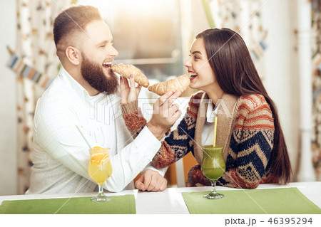 Portrait of a happy young couple in a restaurant 46395294