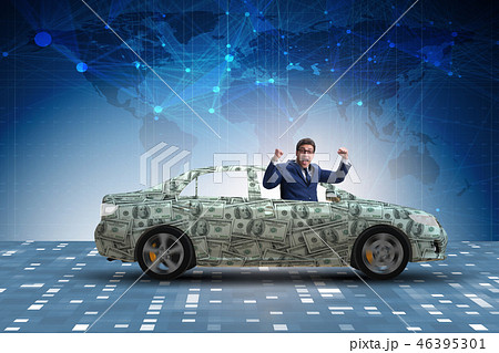 Businessman driving car covered with us dollars 46395301