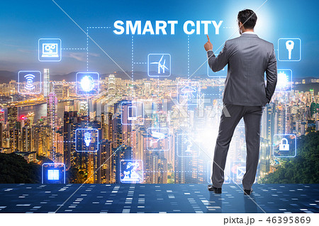 Concept of smart city with businessman pressing buttons Concept of smart city with businessman pressing buttons 46395869