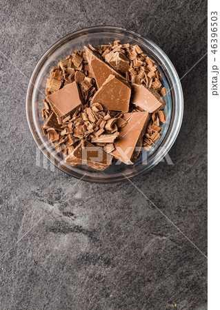 Crushed dark chocolate. 46396503