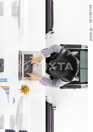 Businesswoman working on computer. Businesswoman working on computer. 46396746