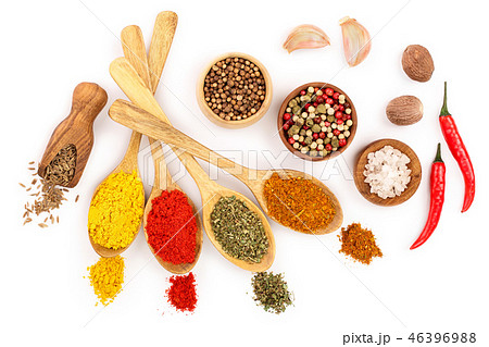 mix of spices in wooden spoon isolated on a white background. Top view. Flat lay. Set or collection 46396988